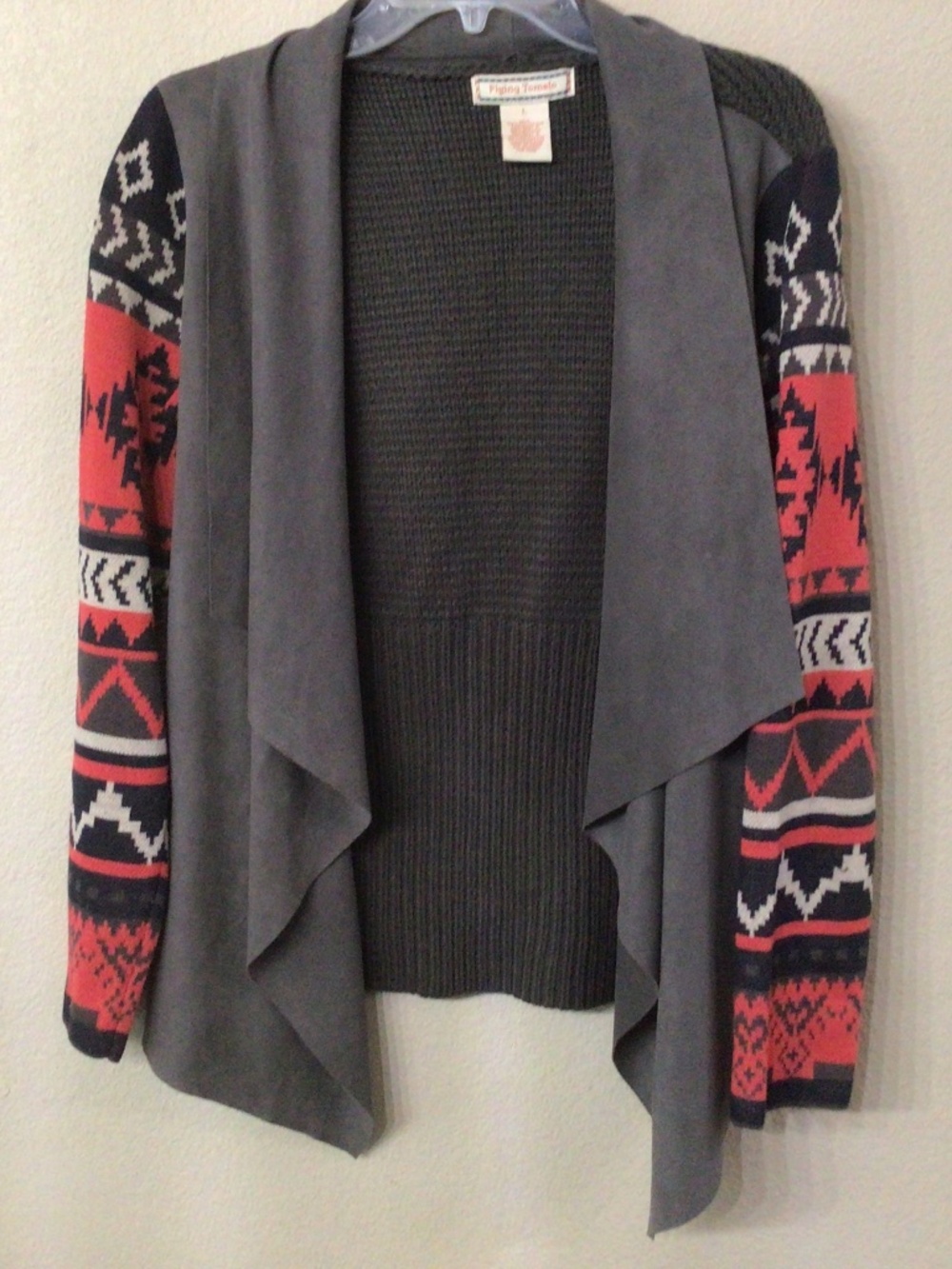 Flying tomato open front sweater with southwestern style sleeves. Size large.